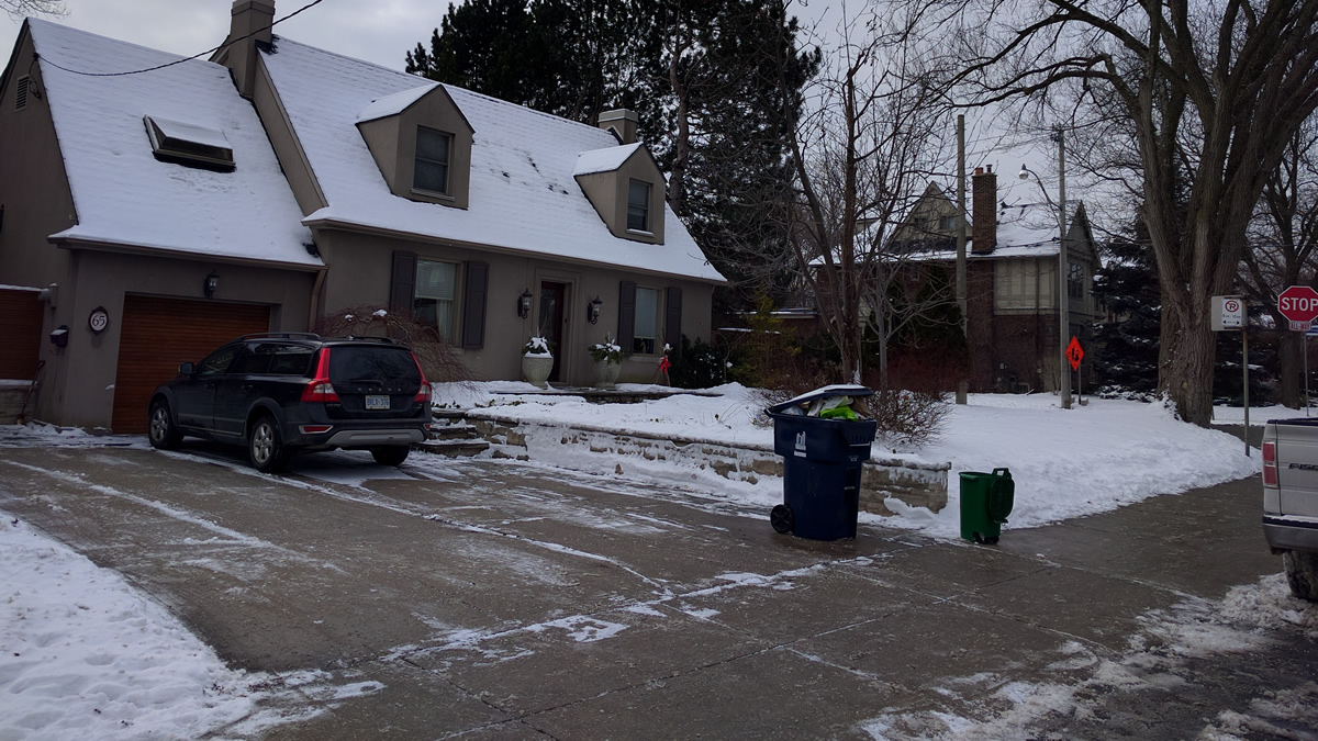 Snow removal including salting and shoveling at a Gardenzilla customer house in Lytton Park in North Toronto