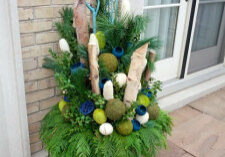 A winter planter featuring birch by Deborah Vivas of Gardenzilla